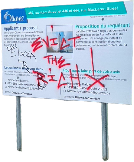 Photo of a city of ottawa building permit sign with Evict the Rich spraypainted over it